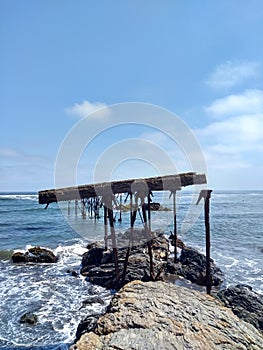 old dock in Llico beach, Maule region, Chile