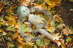 Old doll in Chornobyl exclusion zone. Radioactive zone in Pripyat city - abandoned ghost town. Chernobyl history of