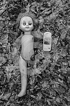 Old doll with dosimeter