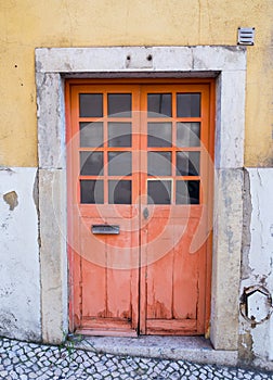 Old door in Bairro Alto, Lisbon, Portugal photo