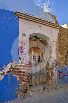 Old door in blue painted Mexican house Oaxaca Mexico