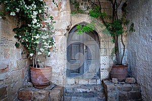 Old door in the fabulous Lindos city. Charming streets