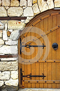 Old Door or Gate in White Stone Wall