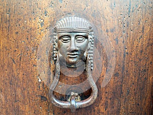 Old door handle in Volterra, Italy