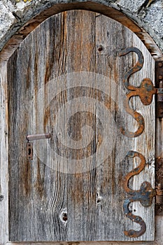 Old door with iron hinges