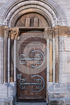 Old door with iron ornaments of a historical building