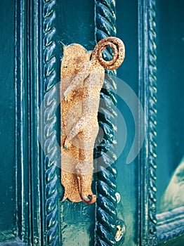 Old door knob (door handle) in the form of a crocodile