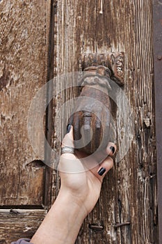Old door knobs and hand