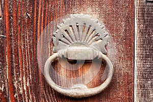 Old door knock with dust