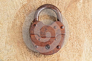 old door lock on a wooden background