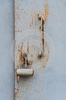 The old door locked with a padlock hanging brackets. Set of backgrounds