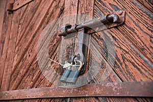 The old door locked with a padlock hanging brackets. Set of backgrounds