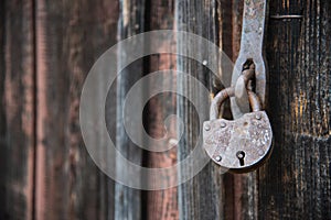 The old door locked with a padlock hanging brackets. Set of backgrounds