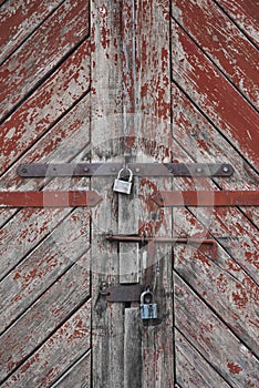 The old door locked with a padlock hanging brackets. Set of backgrounds