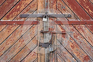 The old door locked with a padlock hanging brackets. Set of backgrounds