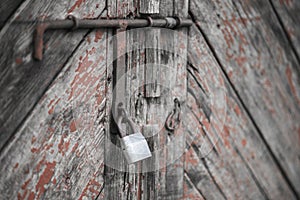 The old door locked with a padlock hanging brackets. Set of backgrounds