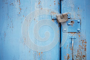 The old door locked with a padlock hanging brackets. Set of backgrounds