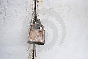 The old door locked with a padlock hanging brackets. Set of backgrounds