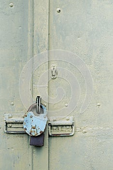 The old door locked with a padlock hanging brackets. Set of backgrounds