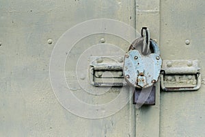 The old door locked with a padlock hanging brackets. Set of backgrounds