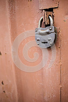 The old door locked with a padlock hanging brackets. Set of backgrounds