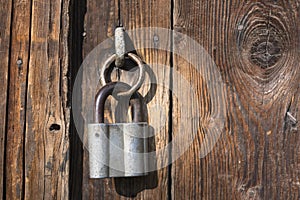 The old door locked with a padlock. Set