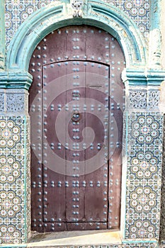 old door of mosque in morocco, photo as background