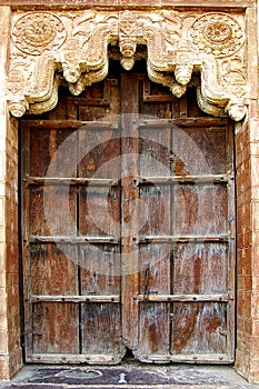 Old door in a palas. Orcha, India