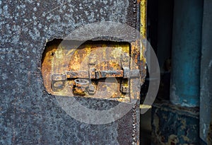 Old door, rusty lock on church photo