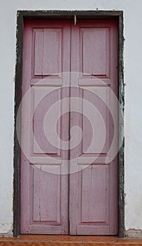 The old door at temple in norther of Thailand photo