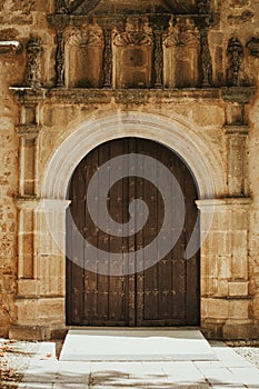 Old door with wrought iron decoration