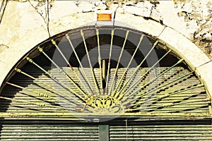 Old door with wrought iron details