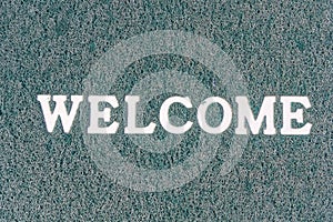 The old doormat of welcome text