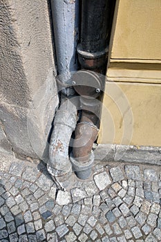 Old downspouts or sewers in the house.