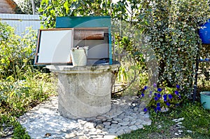 Old draw-well in European village