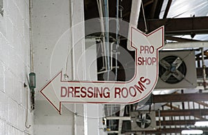 Old dressing room sign in sports arena