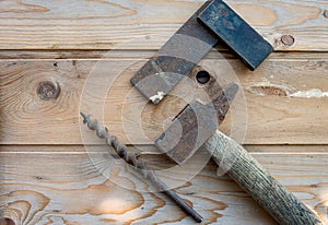 Old drill bit with hammer and set square  ,vintage  hand tools. labour day