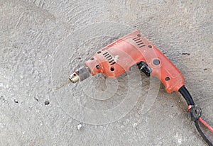 Old drill with concrete