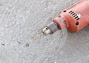 Old drill with concrete