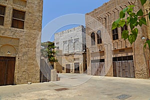 Old Dubai of buildings and traditional Arabian streets. Historical Al Fahidi neighborhood, Al Bastakiya