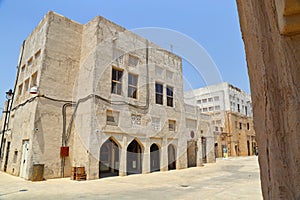 Old Dubai of buildings and traditional Arabian streets. Historical Al Fahidi neighborhood, Al Bastakiya