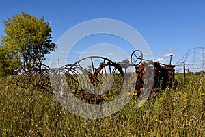 Old dump rake and tractor