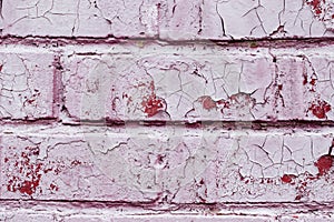 Old dusty brick wall with peeling paint texture