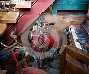 Old, dusty mopeds in the pawn shop