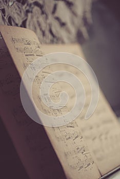 Old dusty notes on a vintage piano