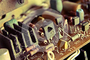 Old dusty radio parts inside the equipment. Close-up