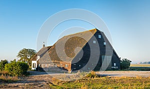 Old Dutch farmhouse with barn