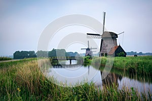 Old dutch windmill in cold morning scenery near Amsterdam