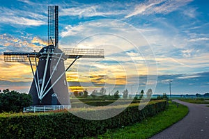 Old dutch windmill by the sunset in Etten-Leur, North Brabant