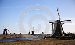 The old Dutch windmills, Holland, rural expanses . Windmills, the symbol of Holland.